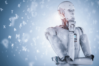 A humanoid robot with a thoughtful expression stands surrounded by floating, scattered letters on a blue background, suggesting artificial intelligence and machine learning concepts.