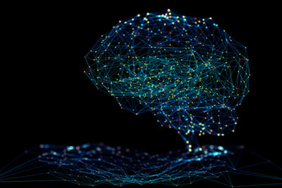 A digital illustration of a brain formed by interconnected glowing blue and yellow nodes and lines, resembling a neural network, set against a black background.