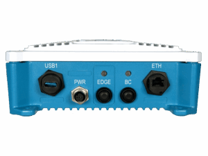 A close-up of a blue electronic device’s back panel showing ports labeled USB1, PWR, EDGE, BC, and ETH, with connectors including USB, Ethernet, and circular power ports.