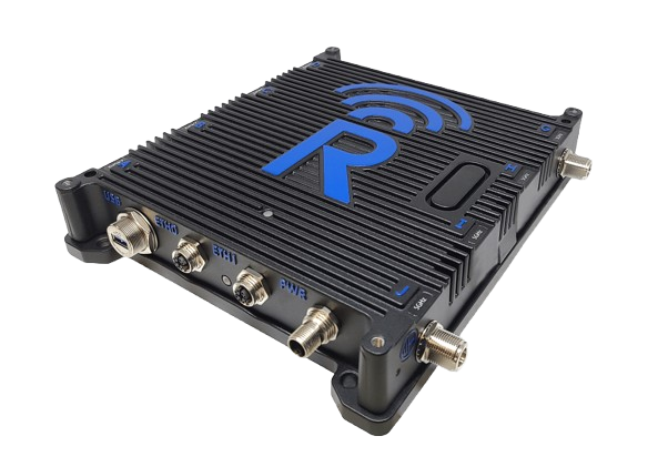 A black electronic device with ridged casing, multiple metal ports on one side, and a large blue letter "R" with a wireless signal icon on top. The device rests on a white background.