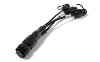 A black multi-pin electrical connector cable with three split ends, each ending in a separate connector, lying on a white background.