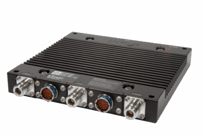 A rectangular black electronic device with ribbed cooling fins and four circular connector ports on one side, labeled with various numbers and text. The device rests on a plain white background.