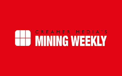 White text on a red background reads "Creamer Media’s Mining Weekly" next to a white square logo divided into four sections.