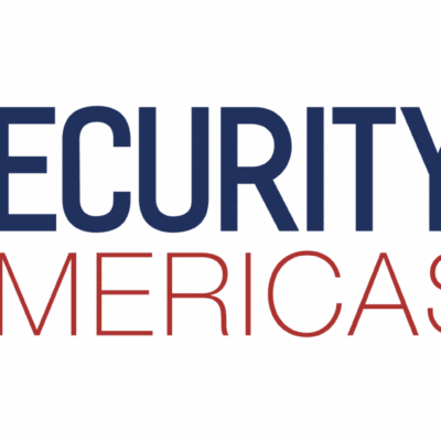 Logo for SJA Security Journal Americas, with a gray map of the Americas in the background and the journal title in large blue and red text.