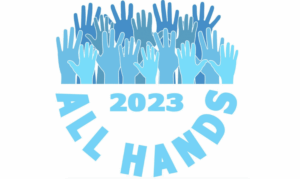 Many blue hands of different shades raised upward above the words "2023 ALL HANDS" written in large, curved blue letters.
