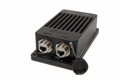 A black electronic device with vented top, labeled "Rovent," featuring two large, metal Ethernet ports labeled "Output" and "Input"; one port has a protective cap attached by a chain.