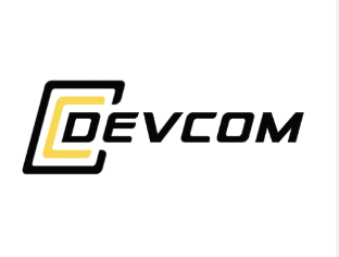 The image shows the DEVCOM logo. The word "DEVCOM" is written in bold, black letters, with the letter "D" highlighted in yellow and partially enclosed by two black, angular brackets. The background is white.
