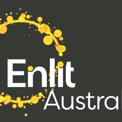 Logo for Enlit Australia featuring “Enlit” in bold white letters and “Australia” in smaller white text, surrounded by a circular pattern of yellow and orange dots on a dark background.