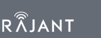 The image shows the RAJANT logo in white text on a gray background. The letter "A" in "RAJANT" has three curved lines above it, resembling a wireless signal symbol.