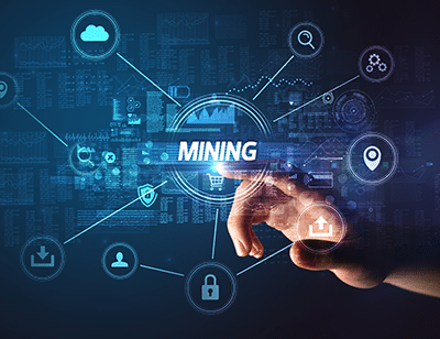 A hand touches a virtual screen with the word "MINING" at the center, surrounded by digital icons representing technology, data, and security, all connected by lines in a futuristic interface.