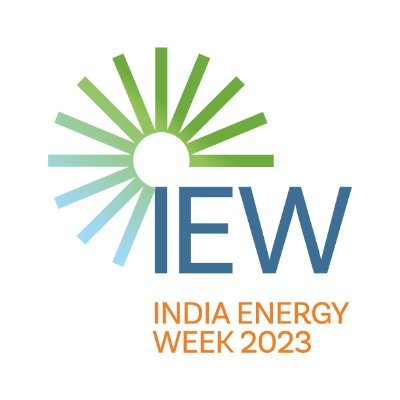 Logo for India Energy Week 2023, featuring a circular, sunburst design in green and blue above the acronym "IEW." Below, "INDIA ENERGY WEEK 2023" is written in orange capital letters.