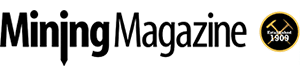 Logo for Mining Magazine showing bold black text "Mining Magazine" with a pickaxe forming the letter "i" in "Mining." A circular emblem with crossed mining tools and "Est. 1909" appears on the right.