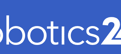 White text on a blue background reads "Robotics247" with "247" in bold and a stylized number 7.