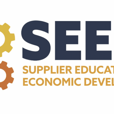 Logo for SEED (Supplier Education & Economic Development) featuring three interlocking gears in yellow, navy, and orange next to the bold text "SEED" and the subtitle in gold text.