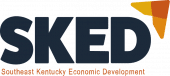 Logo for Southeast Kentucky Economic Development (SKED) featuring large dark blue letters "SKED" and an abstract orange and yellow arrow shape on the top right. The full name appears in orange below the acronym.