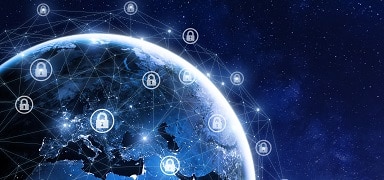 View of Earth from space at night with glowing network lines and padlock icons, symbolizing global digital security and data protection connections spanning the continents.