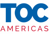 Logo with the large blue letters "TOC" above the smaller red word "AMERICAS" on a light background.