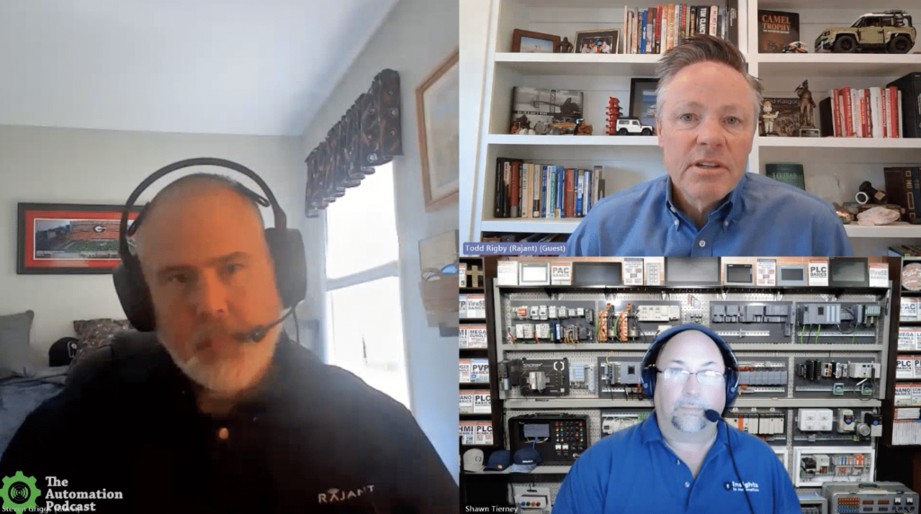 Three men in a video call, each in separate rooms. One is in an office with bookshelves, one wears a headset in a bedroom, and the third is in front of shelves with electronic equipment, wearing a headset and blue shirt.