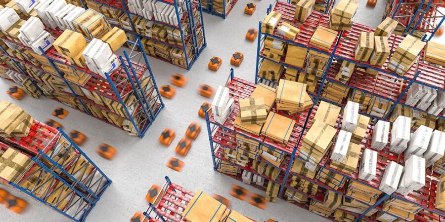 A warehouse filled with tall shelves stacked with cardboard boxes, while many small orange robots move quickly along the aisles between the shelves, organizing and transporting packages.