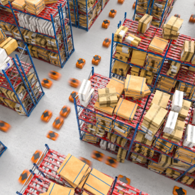 A warehouse with tall shelves filled with various boxes and packages. Numerous small orange robots move between the shelves, suggesting automated logistics and inventory management.
