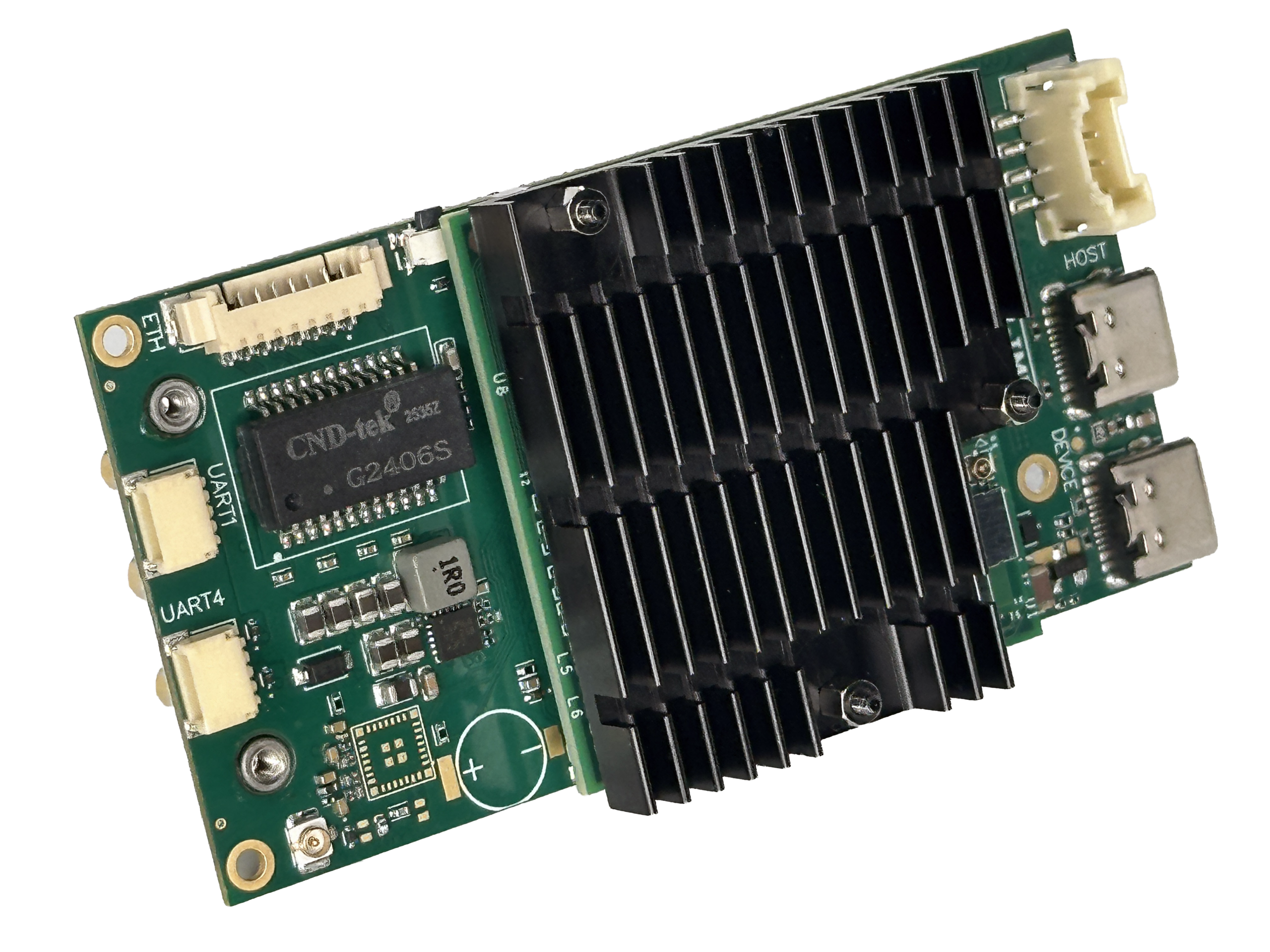 A close-up of a green printed circuit board with multiple electronic components, including a large black heat sink, connectors, chips, and two USB Type-C ports.