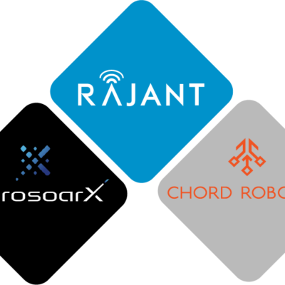 Three diamond-shaped logos: top blue with "RAJANT" and a wireless symbol; bottom left black with "AerosoarX"; bottom right gray with "CHORD ROBOTICS" and an orange geometric design.